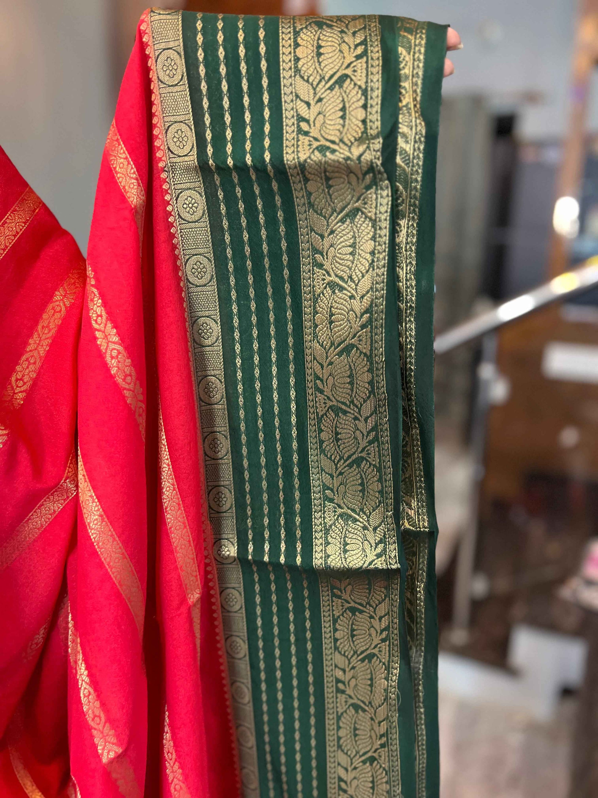 Premium Georgette Saree in Tomato Red with Bottle Green Accents - Craft Of Aele