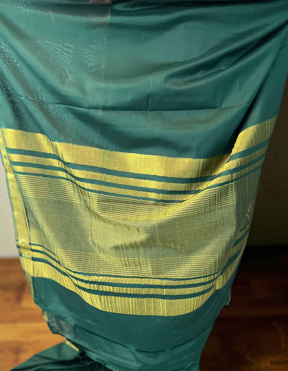Semi Mysore Crepe Fabric in Bottle Green with One Inch Border - Craft Of Aele